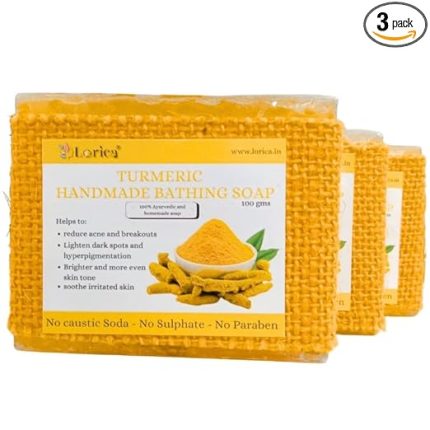 Woman holding Lorica Turmeric Handmade Bathing Soap, showcasing a natural herbal soap for glowing and healthy skin in a premium skincare setting.