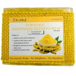 Woman holding Lorica Turmeric Handmade Bathing Soap, showcasing a natural herbal soap for glowing and healthy skin in a premium skincare setting.